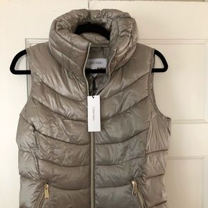 New with tags puffy Calvin Klein silver gold vest